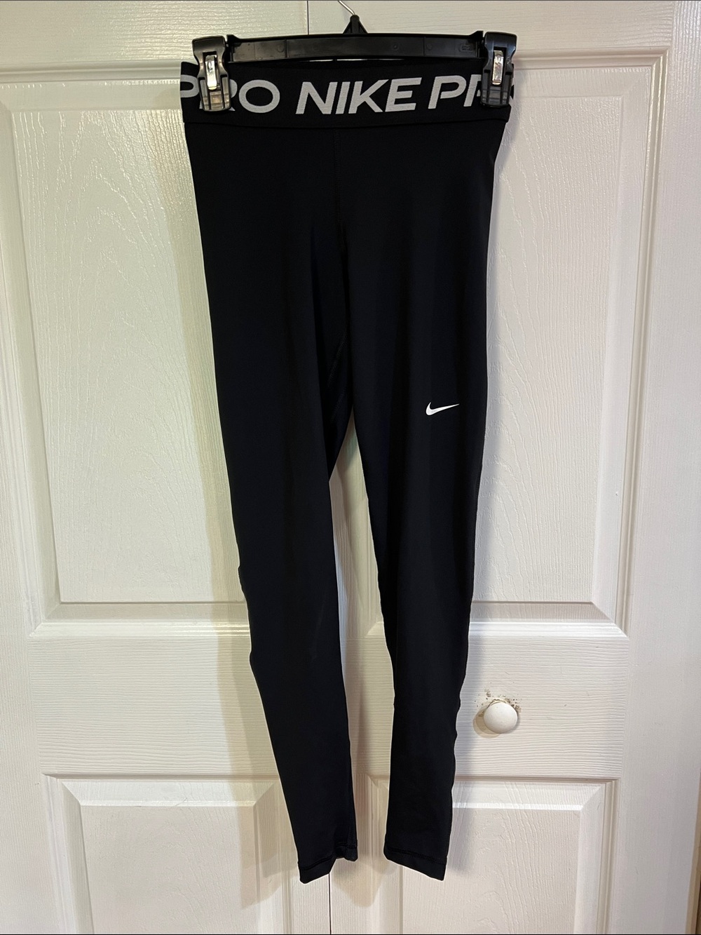 Nike Black High-Waist Performance Leggings with White Swoosh